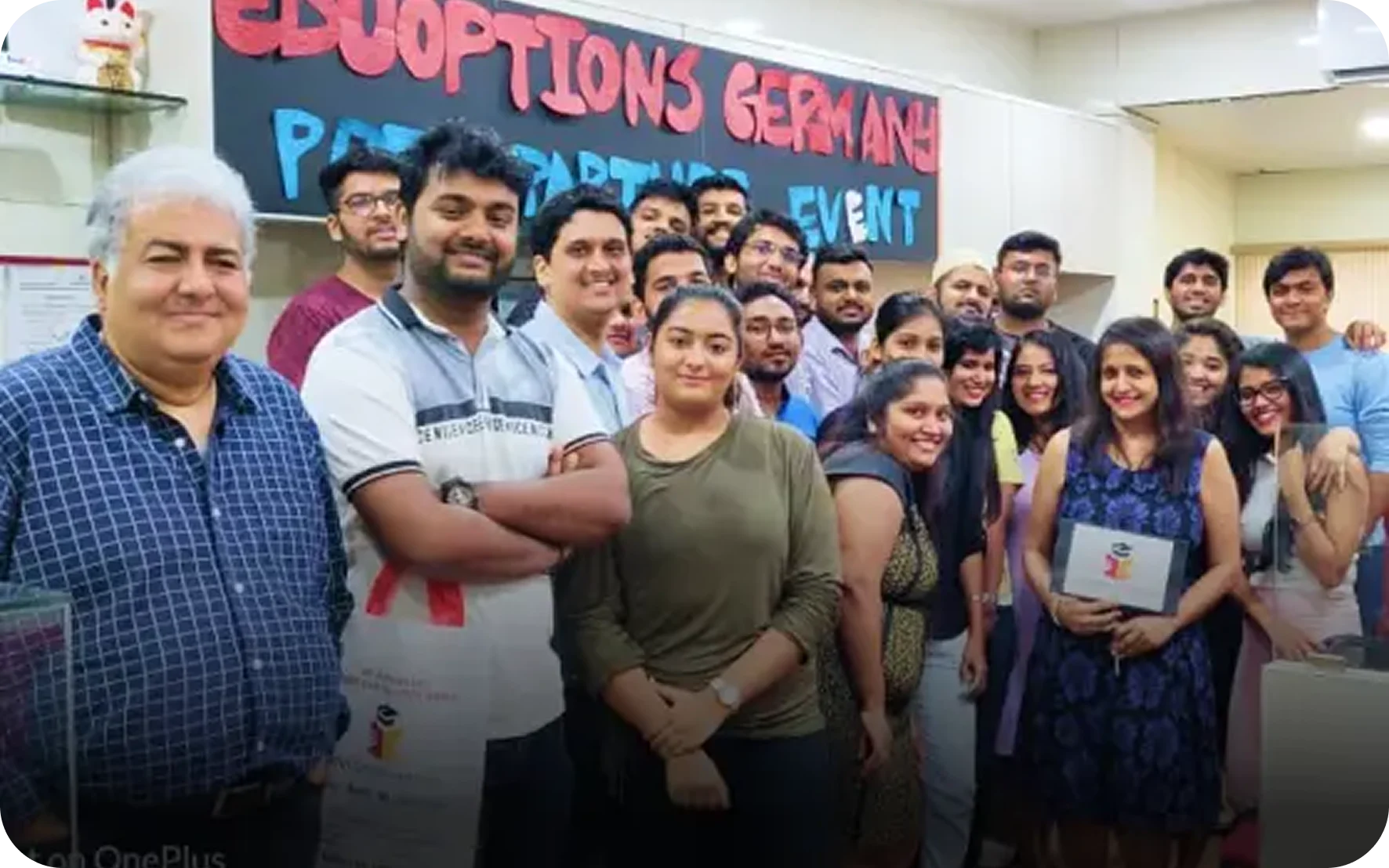 EduOptions Germany students celebrating pre-departure event at Mumbai office